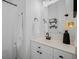 The bathroom features white cabinets, a large mirror, and black fixtures at 124 Corral Cir, Summerville, SC 29485