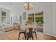 Bright dining area featuring a round table with seating and a sliding glass door to the outdoor patio at 124 Corral Cir, Summerville, SC 29485