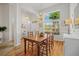 Dining room featuring lots of sunlight with nice window and chandelier at 124 Corral Cir, Summerville, SC 29485