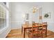 Dining room featuring lots of sunlight with nice window and chandelier at 124 Corral Cir, Summerville, SC 29485
