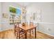 Dining room featuring lots of sunlight with nice window and chandelier at 124 Corral Cir, Summerville, SC 29485