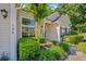 Close-up of well-manicured landscaping, a charming front door, and a cozy, inviting entrance at 124 Corral Cir, Summerville, SC 29485