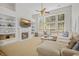 Bright living room features a fireplace, built-in shelves, a large window, and a comfortable sectional sofa at 124 Corral Cir, Summerville, SC 29485