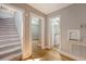 Hallway with staircase leading to bathroom and other rooms at 13 Charlestowne Rd Rd, Charleston, SC 29407
