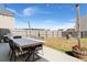 Spacious backyard with a concrete patio, an outdoor dining table, and a built-in grill at 131 Beargrass Ln, Summerville, SC 29486