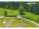 Aerial view of a dog park in a wooded area of the community at 131 Beargrass Ln, Summerville, SC 29486