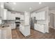 Charming kitchen featuring white cabinetry, granite countertops, and stainless steel appliances at 131 Beargrass Ln, Summerville, SC 29486