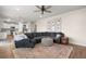 Comfortable living room featuring a plush sectional sofa, ottoman, and stylish decor at 131 Beargrass Ln, Summerville, SC 29486
