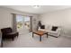 Upstairs living area with comfortable seating and plenty of natural light at 131 Beargrass Ln, Summerville, SC 29486