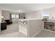 Cozy upstairs loft area with built-in bookcase and comfortable seating at 131 Beargrass Ln, Summerville, SC 29486