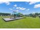 Neighborhood playground featuring multiple play structures and shaded seating areas at 131 Beargrass Ln, Summerville, SC 29486