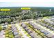 Aerial view of a residential neighborhood highlighting nearby schools and well-maintained homes at 1311 Berry Grove Dr, Summerville, SC 29485