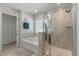 Modern bathroom with separate shower, garden tub, and tiled accents at 1311 Berry Grove Dr, Summerville, SC 29485