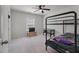 This bedroom features a bunk bed, a small pool table, and carpeted flooring at 1311 Berry Grove Dr, Summerville, SC 29485