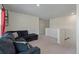 Cozy upstairs living area with plush sectional and neutral carpet at 1311 Berry Grove Dr, Summerville, SC 29485