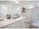 Bright bathroom featuring a double vanity with modern faucets and stylish industrial shelving for added storage and decor at 134 Lucca Dr, Summerville, SC 29486