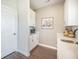 Coffee bar area with white cabinets and appliances, quartz countertops, and decor at 134 Lucca Dr, Summerville, SC 29486