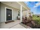 Cozy front porch with seating and decorative landscaping for a welcoming entrance and outdoor relaxation at 134 Lucca Dr, Summerville, SC 29486