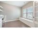 Cozy office nook with custom built-in storage under the window for a functional workspace at 134 Lucca Dr, Summerville, SC 29486