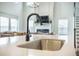 Modern kitchen with island countertop and open floor plan at 134 Lucca Dr, Summerville, SC 29486