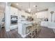 Bright kitchen features a center island with bar stool seating and modern appliances at 134 Lucca Dr, Summerville, SC 29486