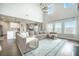 Open-concept living area with large sectional sofa and lots of natural light at 134 Lucca Dr, Summerville, SC 29486