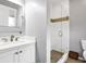 Modern bathroom featuring a glass-enclosed shower and sleek vanity at 1404 Palmetto Blvd, Edisto Beach, SC 29438