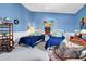 Charming bedroom with twin beds and nautical decorations at 1404 Palmetto Blvd, Edisto Beach, SC 29438