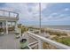 Enjoy the sea breeze on this spacious deck overlooking the ocean at 1404 Palmetto Blvd, Edisto Beach, SC 29438