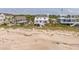 Coastal home with a large deck, private beach access, and views of the ocean at 1404 Palmetto Blvd, Edisto Beach, SC 29438