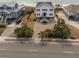 Charming home featuring a well-manicured lawn, brick driveway, and convenient beach access at 1404 Palmetto Blvd, Edisto Beach, SC 29438
