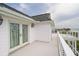 Coastal home's roof deck featuring ocean views and white railings at 1404 Palmetto Blvd, Edisto Beach, SC 29438