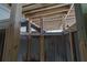 New construction underneath shower with modern piping and wood beams for support at 1404 Palmetto Blvd, Edisto Beach, SC 29438
