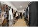 Spacious walk-in closet with ample hanging space and shelving for shoes and accessories at 142 Lucca Dr, Summerville, SC 29486