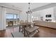 Bright dining area with modern furnishings, sliding glass doors, and lots of natural light at 142 Lucca Dr, Summerville, SC 29486