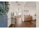 Elegant foyer featuring hardwood floors, stylish decor, and an open view into the living area at 142 Lucca Dr, Summerville, SC 29486
