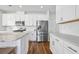 Bright kitchen features stainless appliances, white cabinets, and a stone countertop at 142 Lucca Dr, Summerville, SC 29486