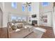 Inviting living room with high ceilings, a fireplace, and plush seating for relaxation and entertainment at 142 Lucca Dr, Summerville, SC 29486