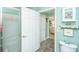 Clean bathroom with a shower, toilet, and built-in shelving with decor at 1571 Blaze Ln, Charleston, SC 29412