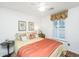 Inviting bedroom with a comfortable bed, natural light, and stylish decor at 1571 Blaze Ln, Charleston, SC 29412