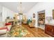 Warm living room with fireplace, comfortable seating, and access to an adjacent bedroom at 1571 Blaze Ln, Charleston, SC 29412