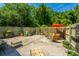 Enclosed patio area with comfortable seating and a view of lush greenery at 1571 Blaze Ln, Charleston, SC 29412