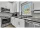 Beautiful kitchen featuring stainless steel appliances, granite countertops, and a modern design at 1733 James Basford Pl, Mount Pleasant, SC 29466