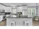 Stunning kitchen with island, stainless steel appliances, and plenty of cabinet space at 1733 James Basford Pl, Mount Pleasant, SC 29466