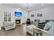 Cozy living room with a fireplace and comfortable seating arrangement at 1733 James Basford Pl, Mount Pleasant, SC 29466