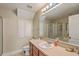 Bathroom with vanity, sink, and shower/bath combo, offering functionality and ample counter space at 1781 Brittlebush Ln, Johns Island, SC 29455
