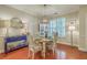 Charming dining area features a decorative light fixture and a beautiful china cabinet at 1781 Brittlebush Ln, Johns Island, SC 29455
