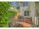 Comfortable outdoor patio area with metal seating, perfect for relaxing and entertaining at 1781 Brittlebush Ln, Johns Island, SC 29455