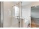 Bright bathroom features a tub, glass shower, and natural light at 1816 Casein St, Summerville, SC 29483