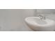 The bathroom features a white sink, a white countertop and a chrome faucet at 1816 Casein St, Summerville, SC 29483